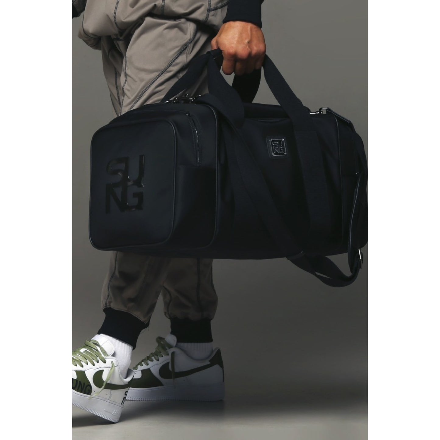 Human Flow Boston Bag