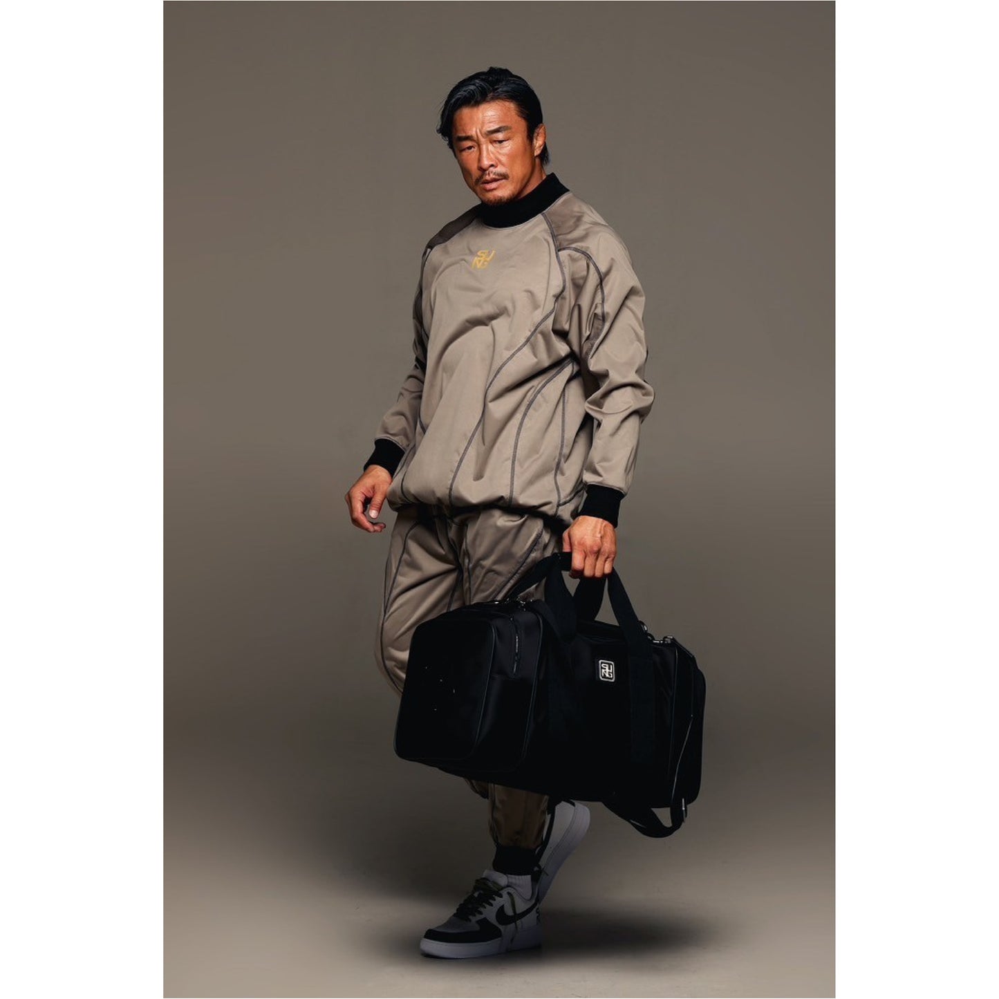 Human Flow Boston Bag